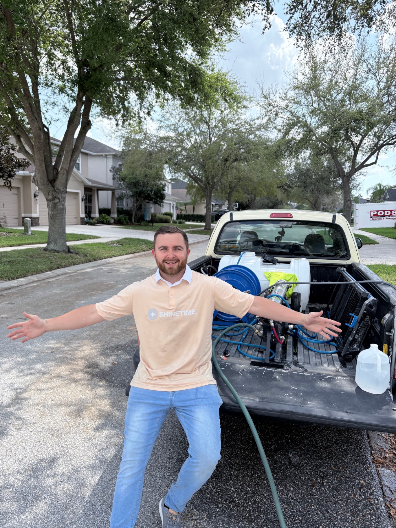Shine Time owner with pure-water cleaning rig in Tampa Bay neighborhood